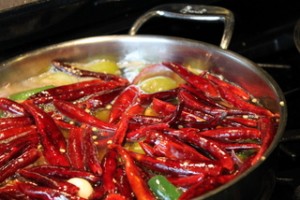 Boiling Chiles de Arbol and Tomatillos