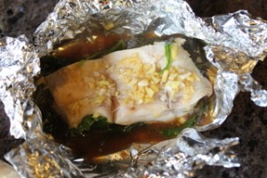 Steamed Ginger Fish on Wilted Spinach