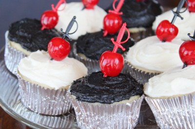 Cherry & Sword-Speared Cupcakes